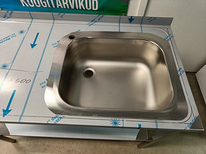 Рабочий стол из нержавеющей стали с 120 раковинами (3 фото из 9)
