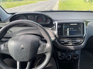 Peugeot 208 1.2 60kw labisoit 100 000 (7 foto / 7)