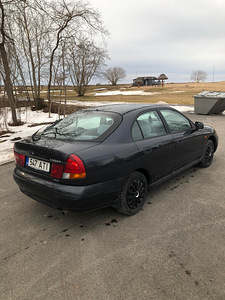 Mitsubishi Carisma (6 фото из 11)