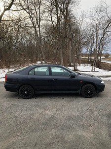 Mitsubishi Carisma (7 фото из 11)