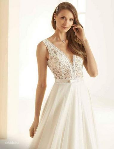 Великолепное свадебное платье кремового тона S / M (фото #1)