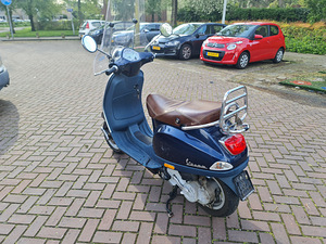 Vespa LX50 4T 2012 (7 foto / 8)
