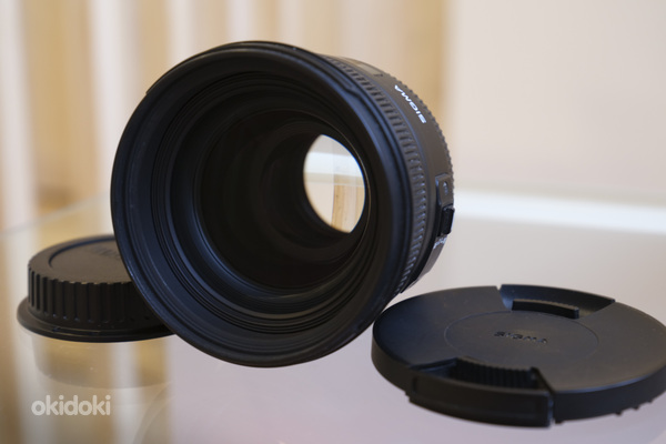 Sigma 50mm f/1.4 EX DG HSM Canon EF (фото #1)