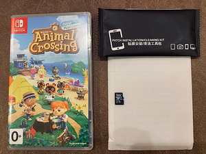 Nintendo Switch + Animal Crossing: New Horizons (2 foto / 6)