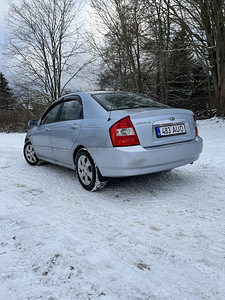 Kia Cerato 2005 (5 фото из 13)