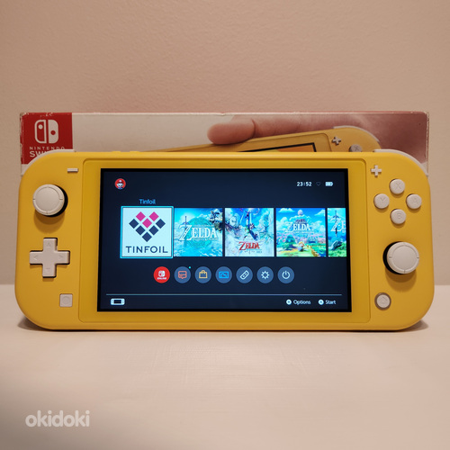 Nintendo Switch Lite CFW + 25 игр + 256 ГБ SD (фото #1)