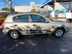 Nissan Almera N16 (5 foto / 15)