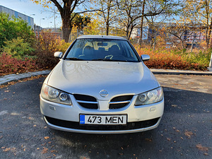 Nissan Almera N16 (7 foto / 15)