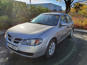 Nissan Almera N16 (8 foto / 15)