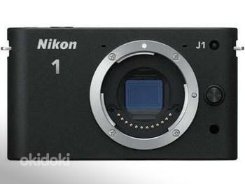 Nikon 1 J1 HD 10-30mm / Nikon 1 S1 / Panasonic Lumix DMC-LX5 (фото #2)