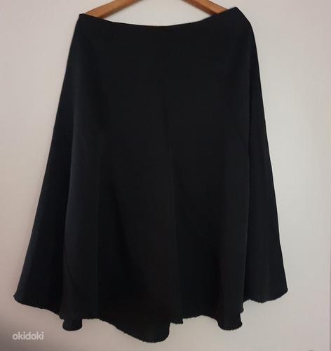 Более вежливая черная юбка (фото #3)