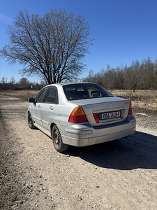 Suzuki Liana , Reg maksutud (4 foto / 8)