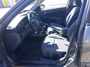 Nissan Almera 2005.1.5b (8 foto / 12)