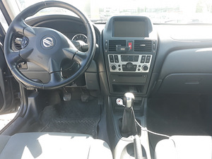 Nissan Almera 2005.1.5b (9 foto / 12)