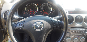 Mazda 6, универсал, 2 л, 2005 г. (7 фото из 14)