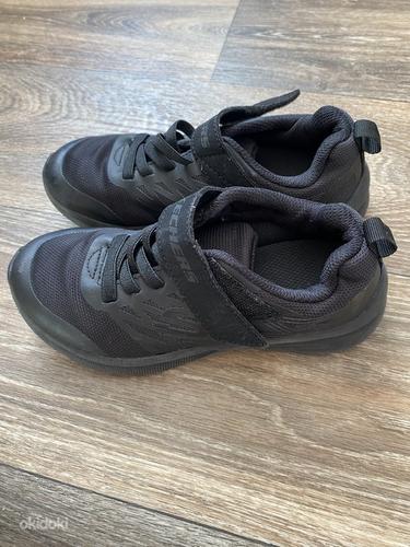 Skechersi tossud