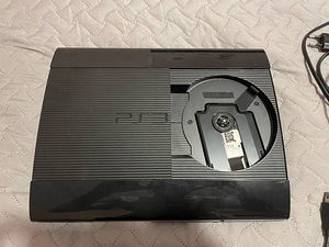 PlayStation 3 (PS3) и 15 игр (1 фото из 3)