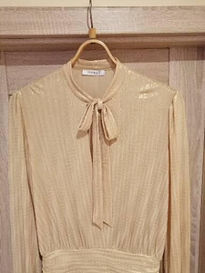 Женская одежда (9 фото из 10)