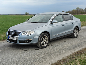 Helesinine automaatkastiga Volkswagen Passat 2005 (2 foto / 15)