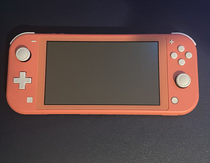 Nintendo Switch Lite - Coral (1 фото из 2)