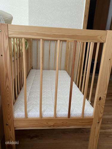 Прекрасная деревянная детская кроватка. (фото #1)