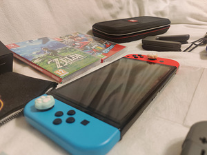 Nintendo Switch OLED+Чехол+Игры+Подарок (4 фото из 4)