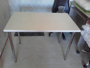 White wooden top, steel legs and frame, table